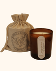 Photo of Mummy's Organics Instinctive Birth Candle from the front standing next to cotton bag