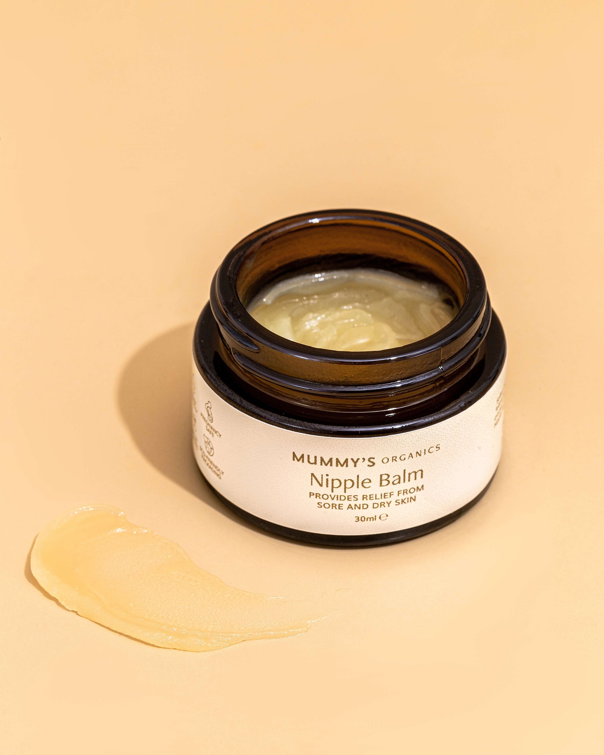 Photo of Mummy&#39;s Organics Organic Scar Balm from the top with the lid off