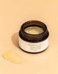 Photo of Mummy's Organics Organic Scar Balm from the top with the lid off